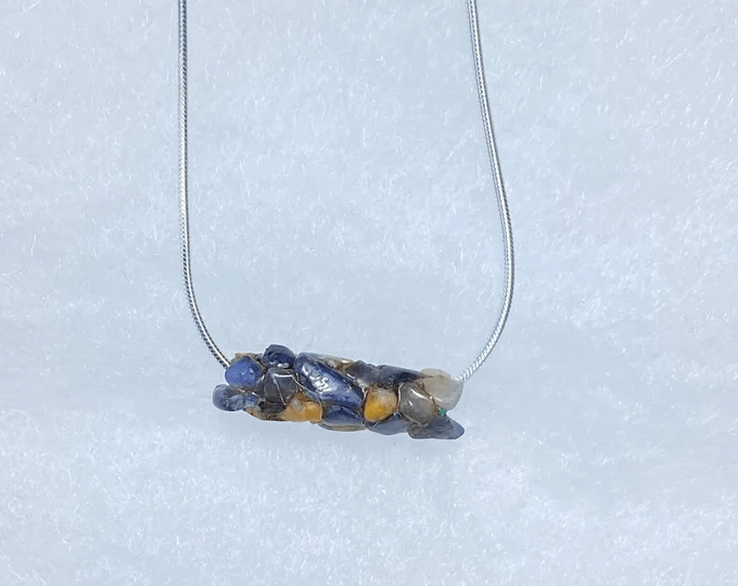 blue and gold gemstone caddisfly necklace