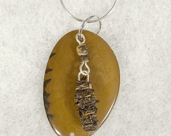 a brown natural caddisfly earring set