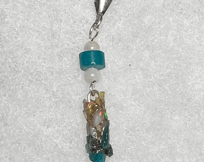 blue gemstone caddisfly necklace