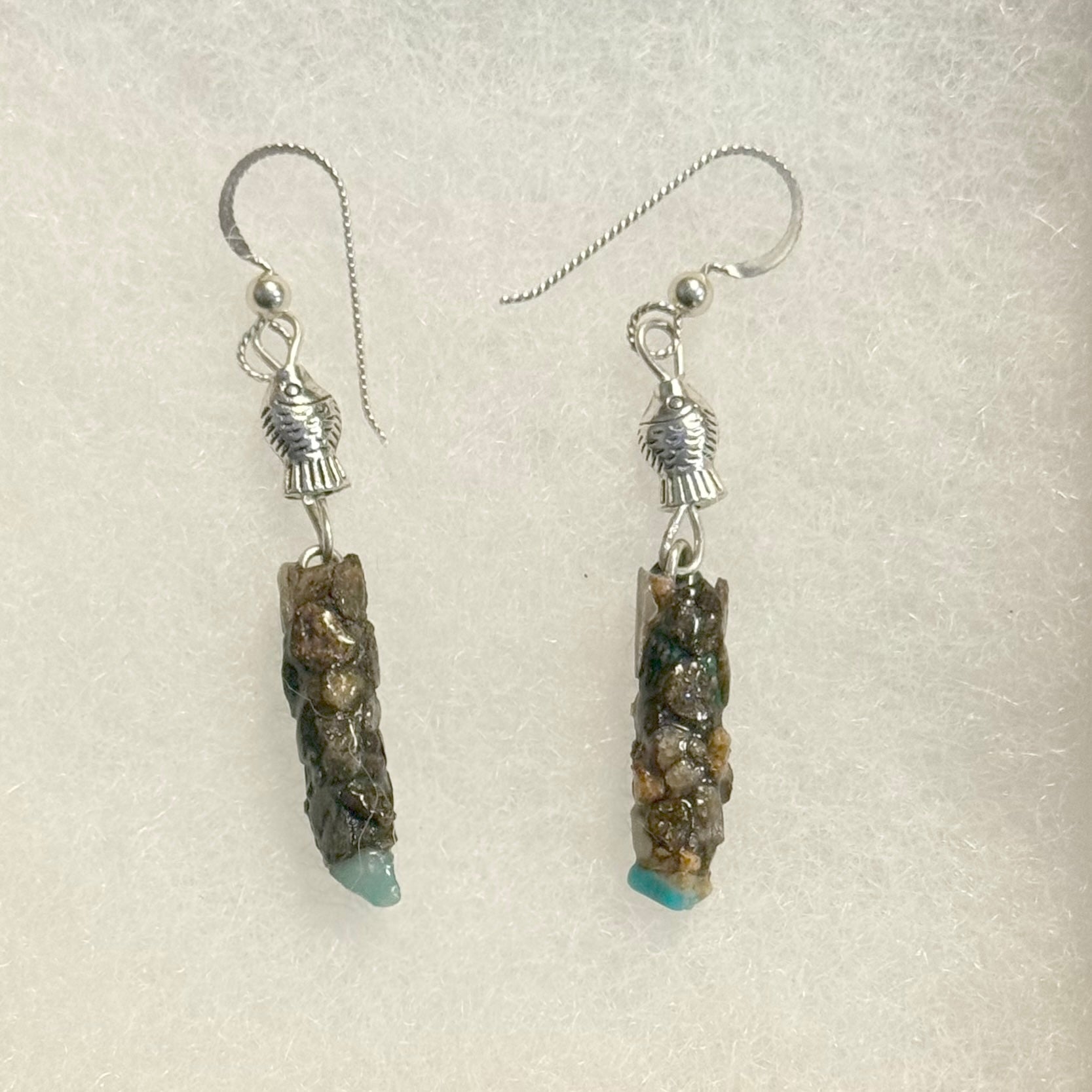 Natural Caddisfly Case earrings with special stone on the bottom.