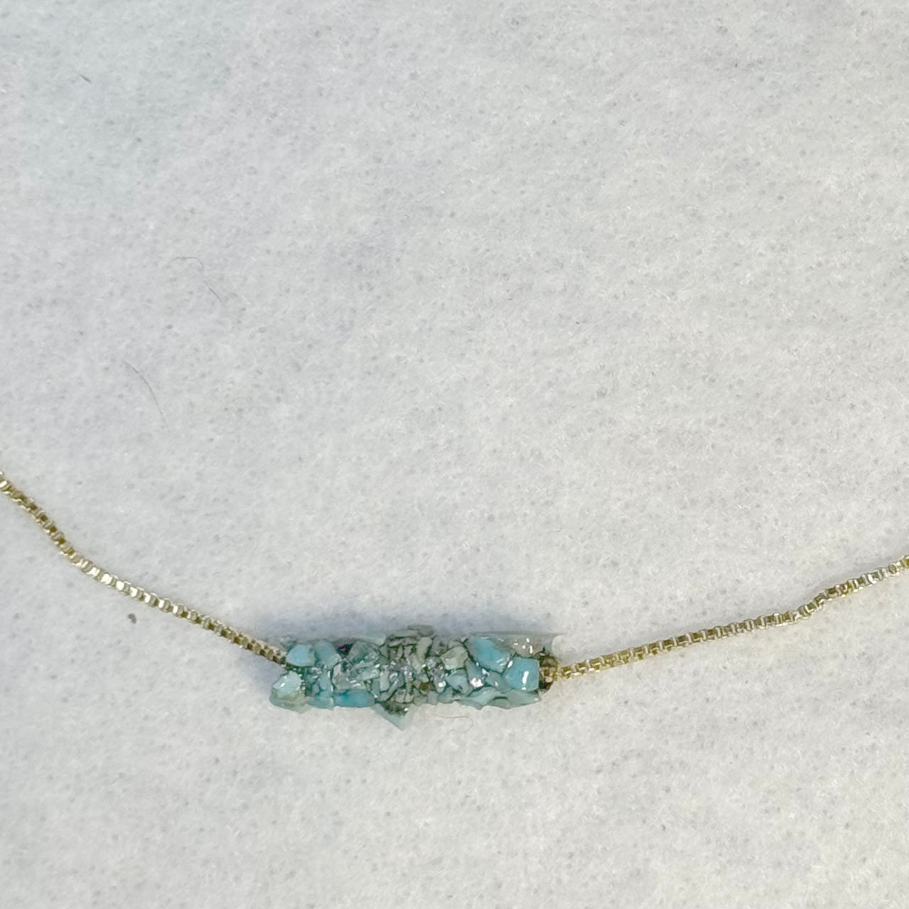 Turquoise Caddisfly case necklace on Gold Filled Chain